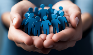 Hands holding blue icons of people, representing customer retention and follow-up.
