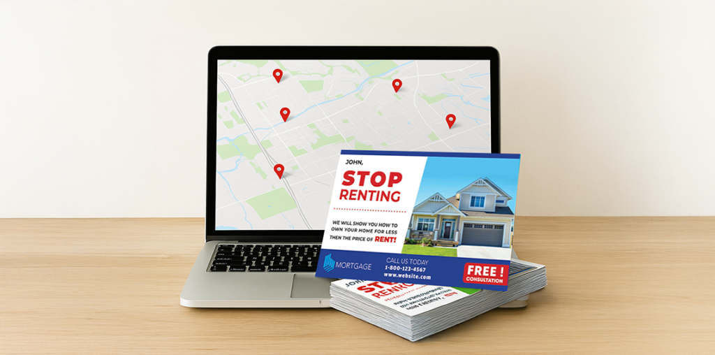 Stack of mortgage postcards in front of a laptop displaying a local ZIP code map for EDDM targeting.