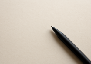 Blank handwritten-style letter paper with a pen, ready for personalized print messaging.